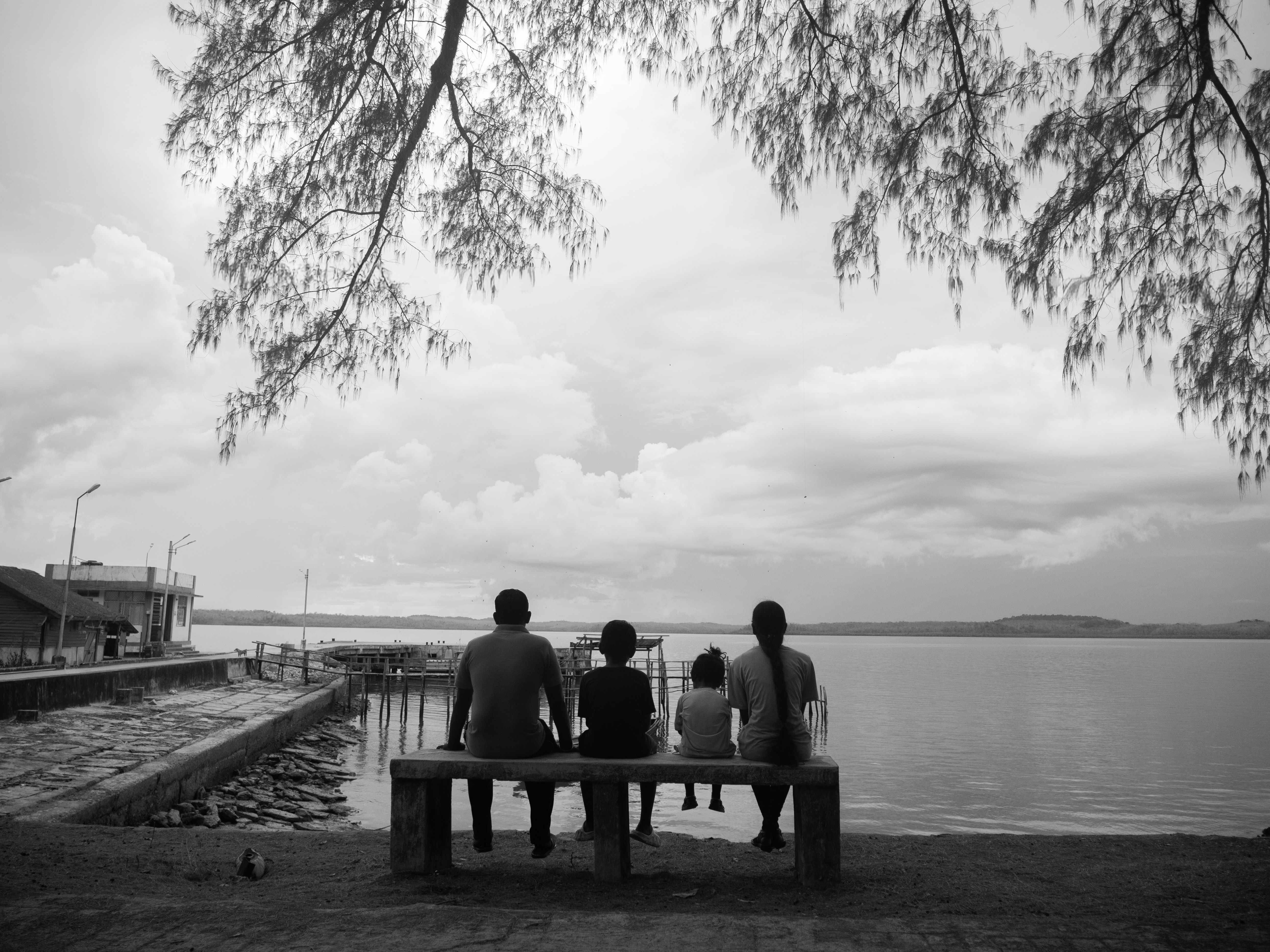 Abstract grayscale image representing family relationships and reflection