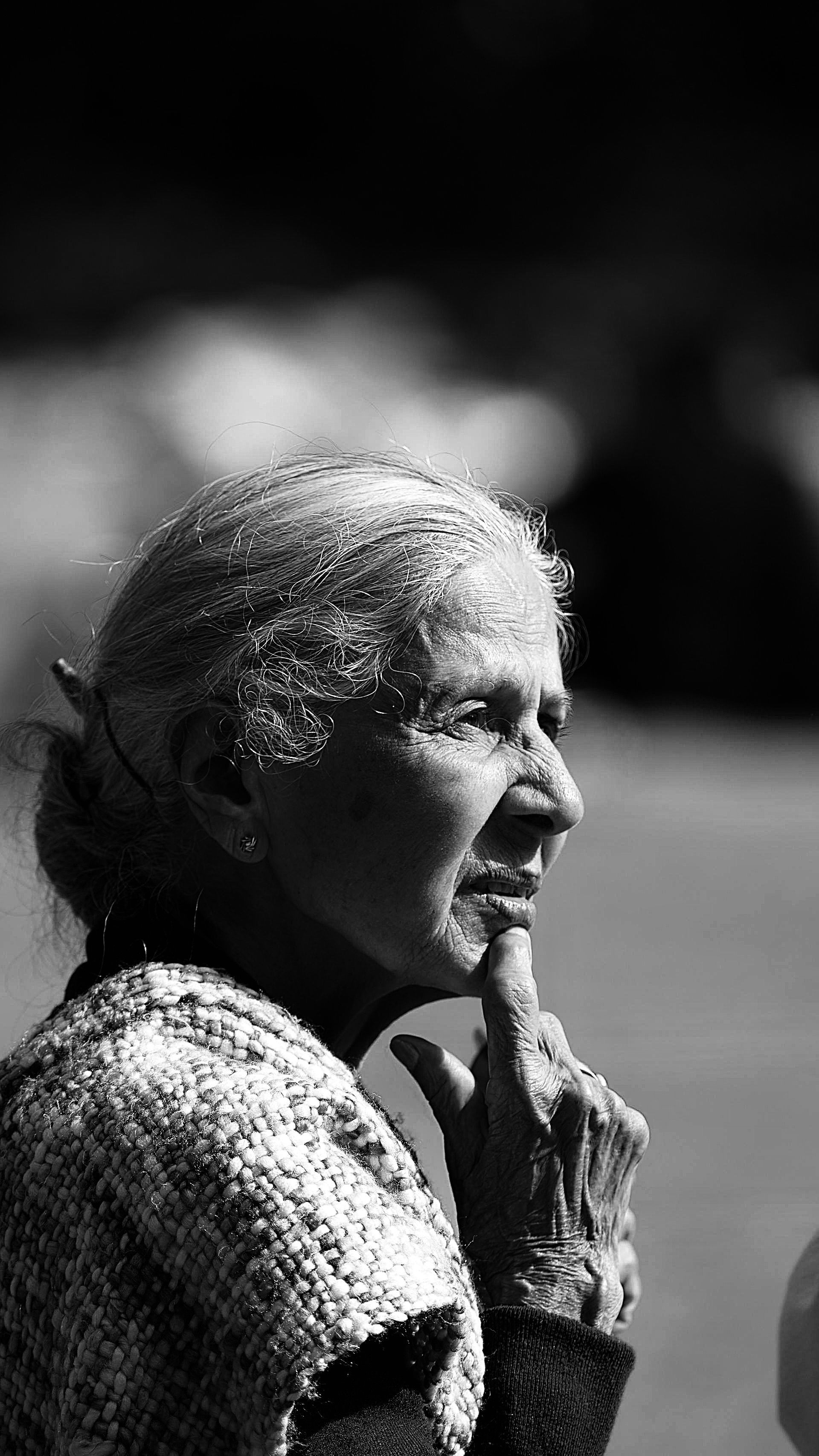 Older adult in reflective portrait